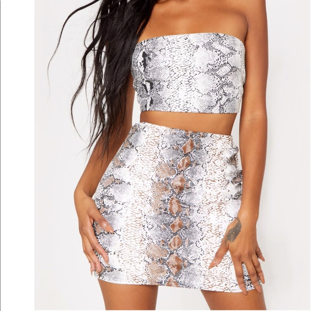 Snake print faux leather mini skirt